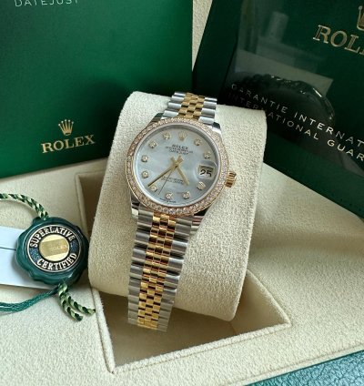 Rolex Datejust 31 2023 Two Tone Yellow Gold Mother Of Pearl Dial Fluted Bezel Jubilee Bracelet