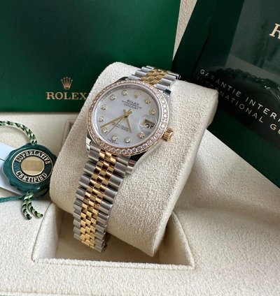 Rolex Datejust 31 2023 Two Tone Yellow Gold Mother Of Pearl Dial Fluted Bezel Jubilee Bracelet