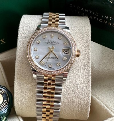 Rolex Datejust 31 2023 Two Tone Yellow Gold Mother Of Pearl Dial Fluted Bezel Jubilee Bracelet