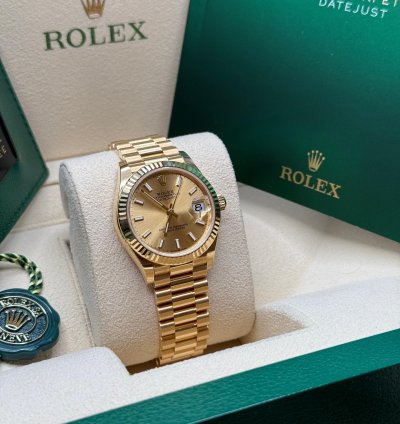 Rolex Datejust 31 New 2024 Champagne Index Dial Fluted Bezel Yellow Gold President