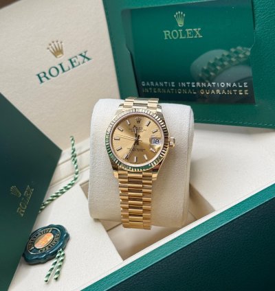 Rolex Datejust 31 New 2025 Champagne Index Dial Fluted Bezel Yellow Gold President