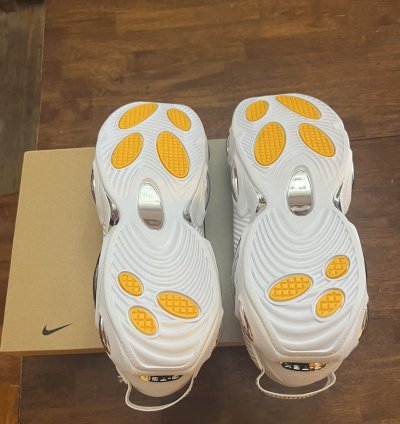 Nike Nocta Glide Triple White Drake White Chrome Sneaker
