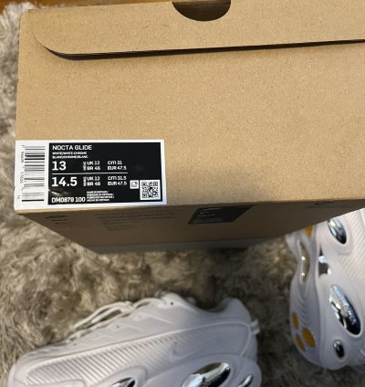 Nike Nocta Glide Triple White Drake White Chrome Sneaker