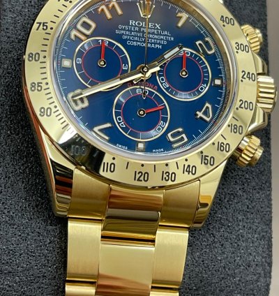 Rolex Daytona 116528 - Blue Dial - Yellow Gold - 2014 - Unworn