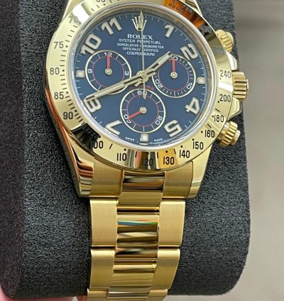 Rolex Daytona 116528 - Blue Dial - Yellow Gold - 2014 - Unworn
