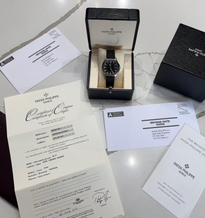 Patek Philippe Aquanaut One Owner Barely Used With Original Papers And Box