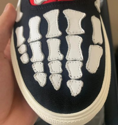 Low Top Skeleton Sneaker In Black Red