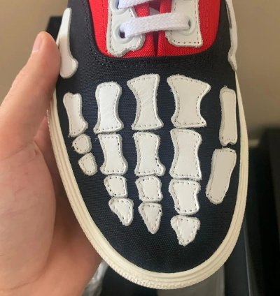 Low Top Skeleton Sneaker In Black Red