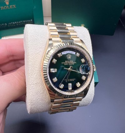 Rolex Day-date 36 Green Baguette Dial Yellow Gold 36mm