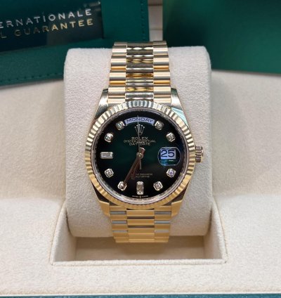 Rolex Day-date 36 Green Baguette Dial Yellow Gold 36mm