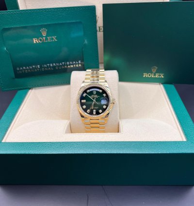 Rolex Day-date 36 Green Baguette Dial Yellow Gold 36mm