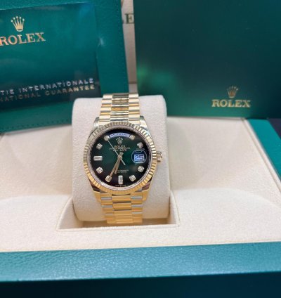Rolex Day-date 36 Green Baguette Dial Yellow Gold 36mm