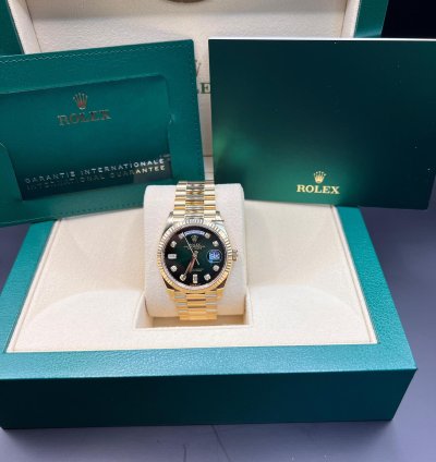 Rolex Day-date 36 Green Baguette Dial Yellow Gold 36mm