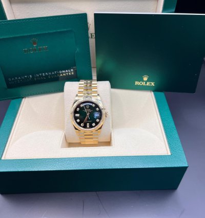 Rolex Day-date 36 Green Baguette Dial Yellow Gold 36mm
