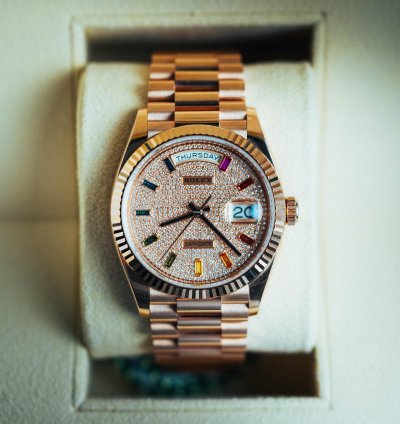 Rolex Day-date 36 Rainbow Baguette 128235 President
