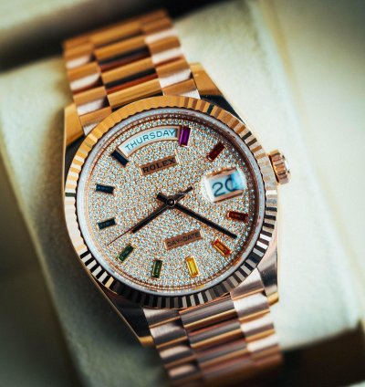 Rolex Day-date 36 Rainbow Baguette 128235 President
