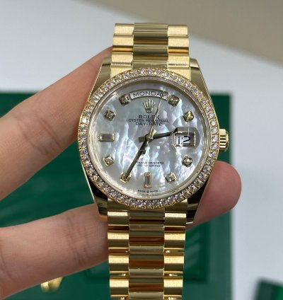 Rolex Day-date 36 White Mother Of Pearl Baguette Diamond Dial Yellow Gold President Diamond Beze