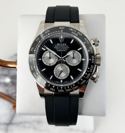 Rolex Daytona 40mm White Gold Black Ceramic Bezel Black Silver Index Dial Oysterflex Bracelet