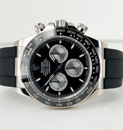 Rolex Daytona 40mm White Gold Black Ceramic Bezel Black Silver Index Dial Oysterflex Bracelet