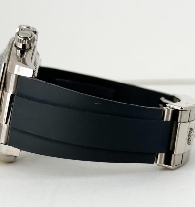 Rolex Daytona 40mm White Gold Black Ceramic Bezel Black Silver Index Dial Oysterflex Bracelet