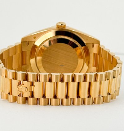 Rolex Day-date 40 40mm Fluted Bezel Yellow Gold Champagne Baguette Diamond Dial Presidential Band