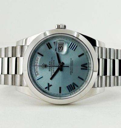 Rolex Day-date 40 40mm Smooth Bezel Platinum Ice Blue Roman Dial Presidential Band 228206