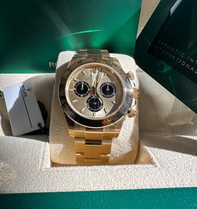 Rolex Daytona Cosmograph Daytona New Reference 2024 Yellow Gold Champagne Dial Black Subdials