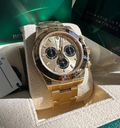 Rolex Daytona Cosmograph Daytona New Reference 2024 Yellow Gold Champagne Dial Black Subdials