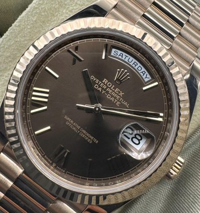 Rolex Day-date 40 Chocolate Roman Dial Unworn