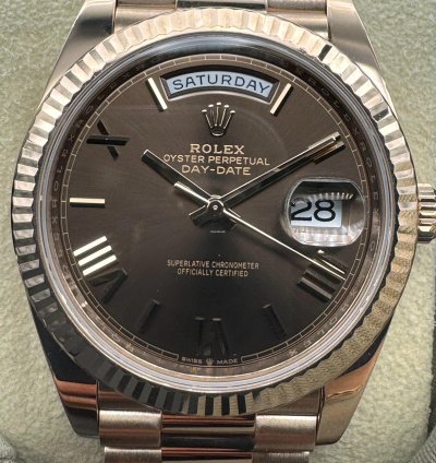 Rolex Day-date 40 Chocolate Roman Dial Unworn