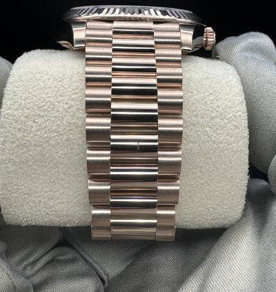 Rolex Day-date 40 Chocolate Roman Dial Unworn