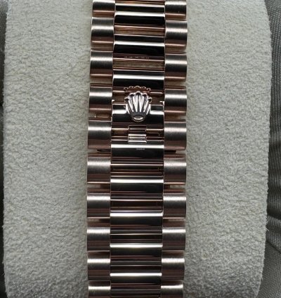 Rolex Day-date 40 Chocolate Roman Dial Unworn