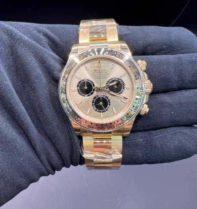 Rolex Daytona Cosmograph Daytona Yellow Gold Champagne Black Dial New Ref