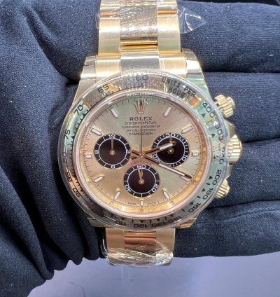Rolex Daytona Cosmograph Daytona Yellow Gold Champagne Black Dial New Ref