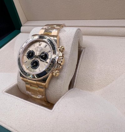 Rolex Daytona Cosmograph Daytona Yellow Gold Champagne Black Dial New Ref