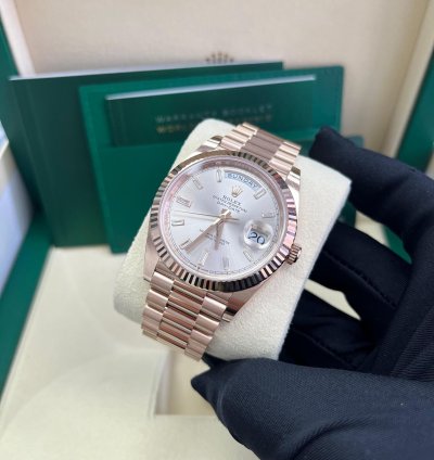 Rolex Day-date 40 Fluted Bezel Sundust Baguette Diamond Dial President Bracelet 228235