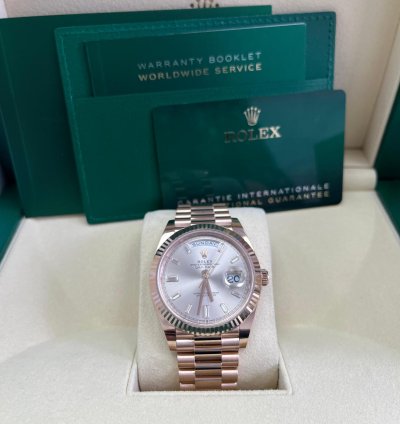 Rolex Day-date 40 Fluted Bezel Sundust Baguette Diamond Dial President Bracelet 228235