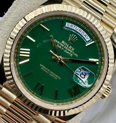 Rolex Day-date 40 Green Roman Dial Unworn