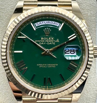 Rolex Day-date 40 Green Roman Dial Unworn