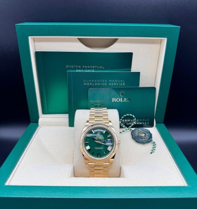 Rolex Day-date 40 Green Roman Dial Unworn