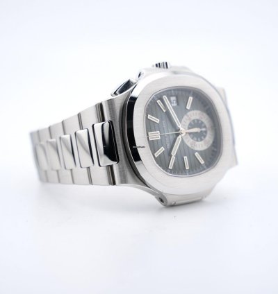 Patek Philippe Nautilus Chronograph Black Dial With White Gold Indexes - With Extract From The Archives