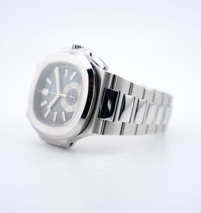 Patek Philippe Nautilus Chronograph Black Dial With White Gold Indexes - With Extract From The Archives