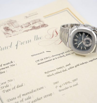 Patek Philippe Nautilus Chronograph Black Dial With White Gold Indexes - With Extract From The Archives