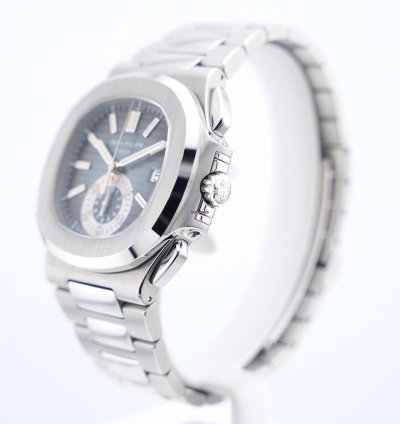 Patek Philippe Nautilus Chronograph Black Dial With White Gold Indexes - With Extract From The Archives