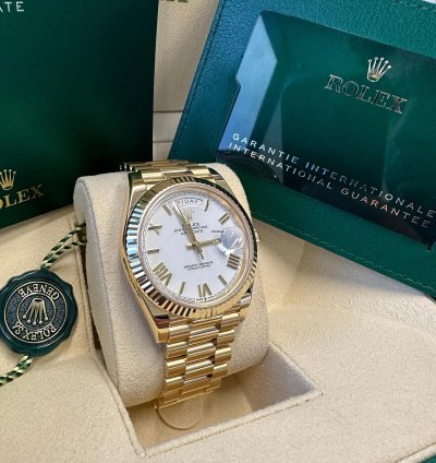 Rolex Day-date 40 New 2023 White Roman Dial Yellow Gold Fluted Bezel Jubilee Bracelet