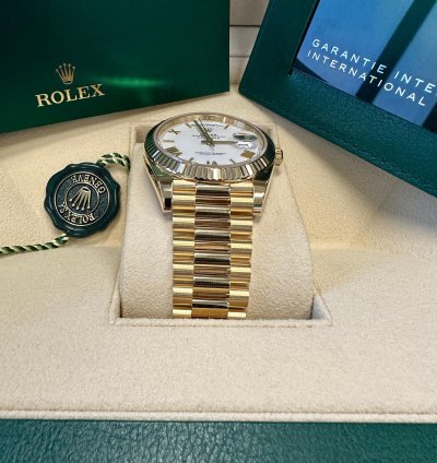 Rolex Day-date 40 New 2023 White Roman Dial Yellow Gold Fluted Bezel Jubilee Bracelet