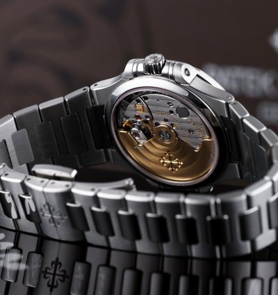 Patek Philippe Nautilus Ladies Automatic Ref 7018 1a-001 Silver Dial 33mm Stainless Steel Box And Papers 2015