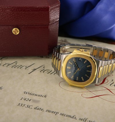 Patek Philippe Nautilus Ref 3800 18kt Yellow Gold And Stainless Steel Blue Patina Dial From Year 1984