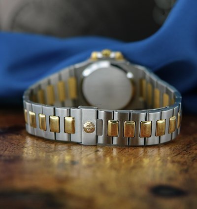 Patek Philippe Nautilus Ref 3800 18kt Yellow Gold And Stainless Steel Blue Patina Dial From Year 1984