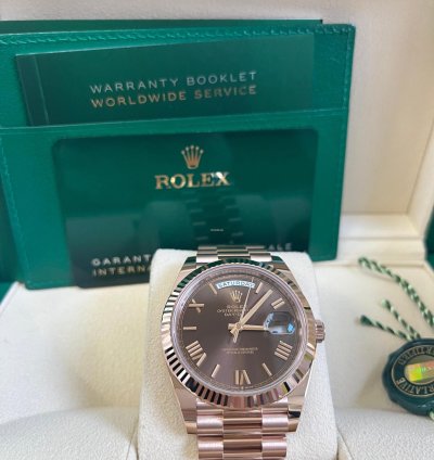 Rolex Day-date 40 Rose Gold Chocolate Roman Dial Fluted Bezel 228235